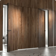 Межкомнатные скрытые двери-невидимки с деревянной отделкой, оформленные в едином стиле со стеной.